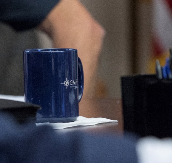 CMPAS Coffee Mug on Desk
